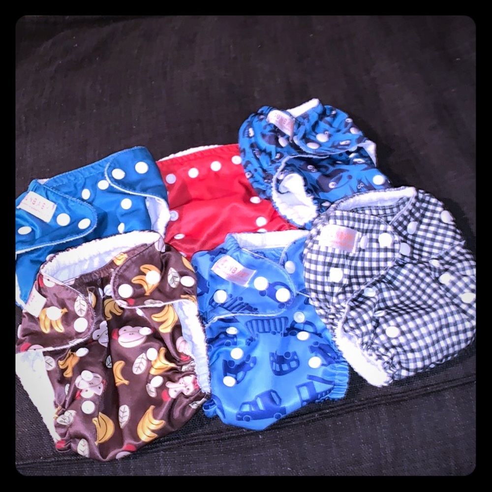 Lot of 4 sun baby cloth diapers with inserts